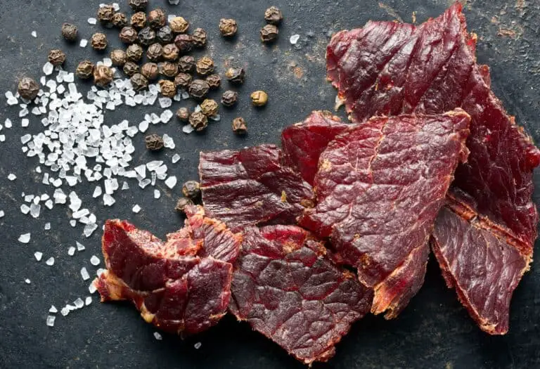 beef jerky and spice on old table