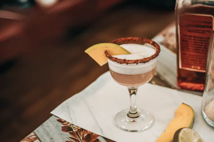 The little devil drink on a table.