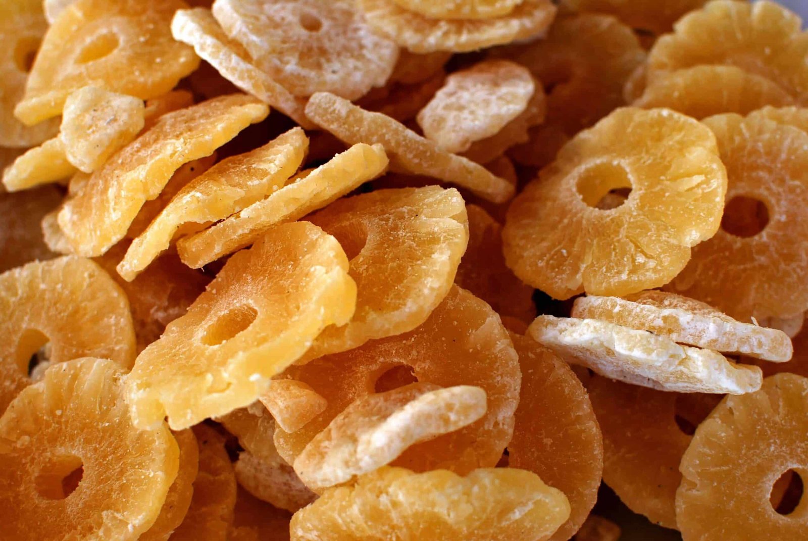 picture of loads of dehydrated pineapples rings