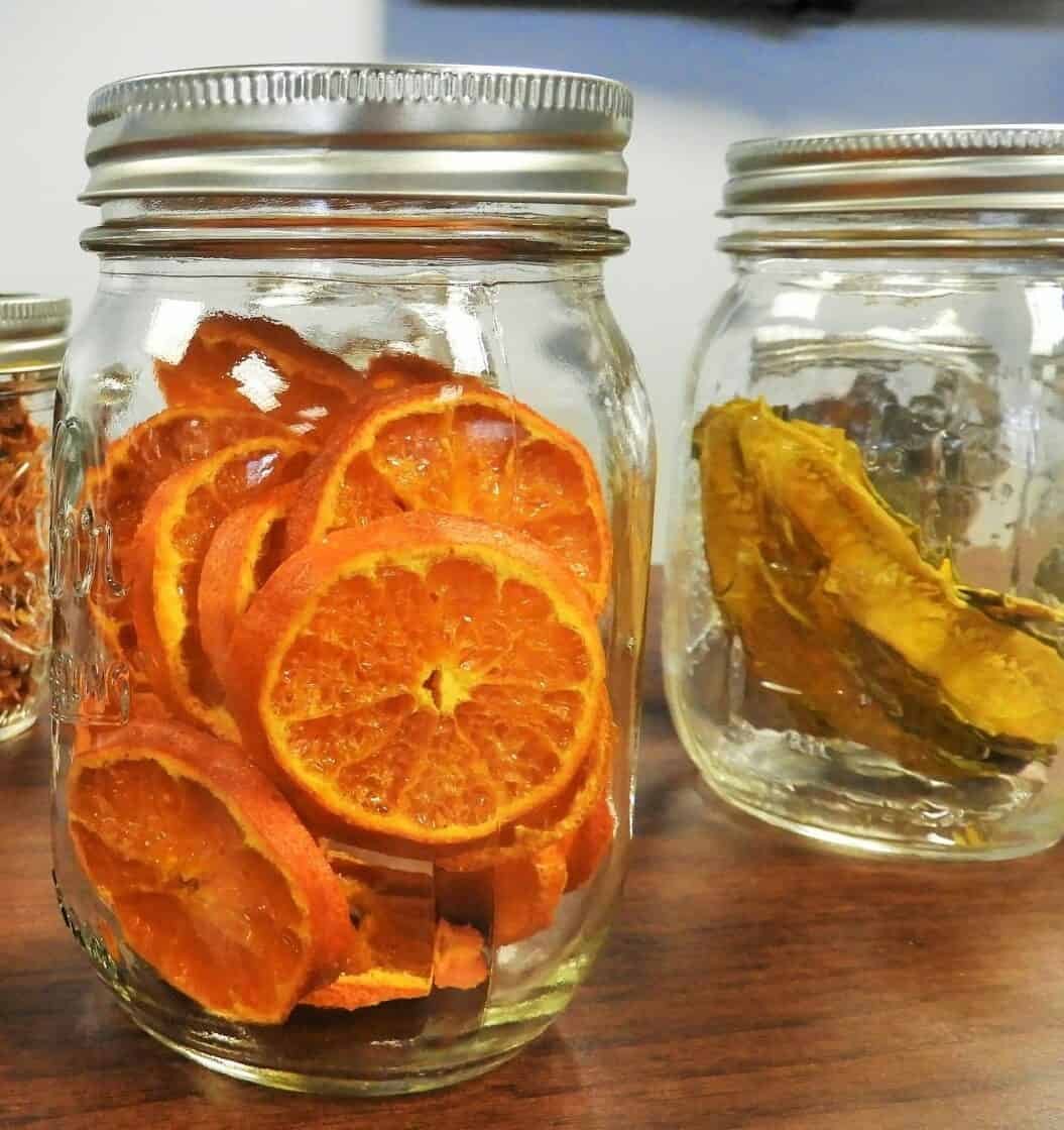 dehydrated rasberries, oranges, mushrooms banana in glass jars