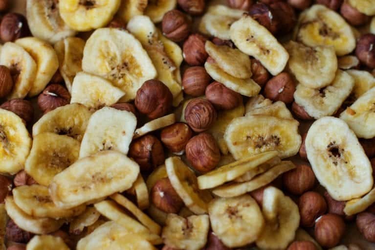 dehydrated banana chips and nuts mixed together