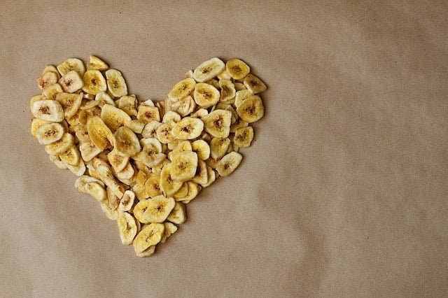 banana chips piled with brown background