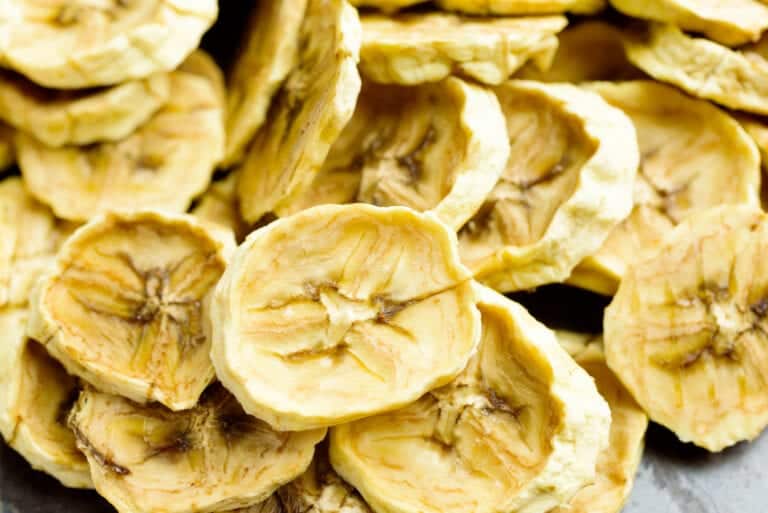 Pile of sweet dehydrated banana slices.