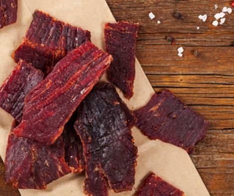 Delicious Beef Jerky Background. Selective focus.