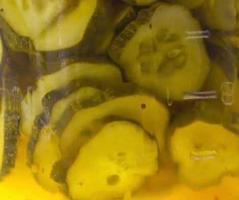 close up of a jar of homemade pickles