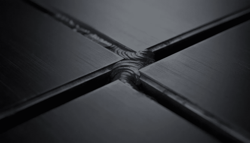 The image features a close-up of a black stainless steel dehydrator, showcasing its sleek construction and control panel. This effective and affordable dehydrator is designed for efficient dehydrating, with proper heat retention and perfect airflow for evenly dried meats, fruits, and vegetables.