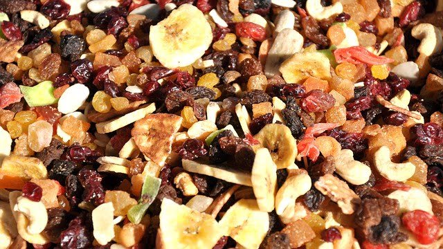 mix of dried fruits and nuts overlapping each other.
