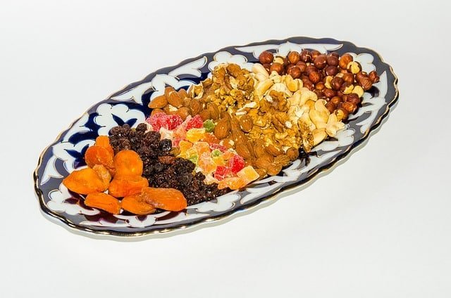 dried fruit and nut mix on plastic oblong tray