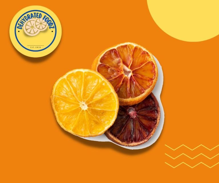 dried slices of orange and blood orange on an orange background. Dehydrated foodz yellow logo on top right corner