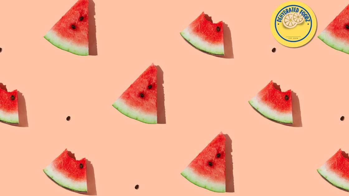 sliced triangle watermelons on a peach background