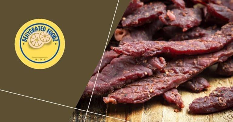 beef jerky on a wooden background.