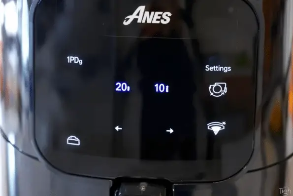 A closeup view of air fryer settings.