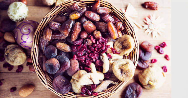 Dried fruits in a basket on a grey background