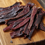 venison jerky on a wooden table