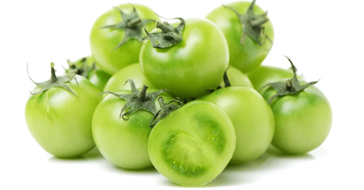 green tomatoes on a white background.