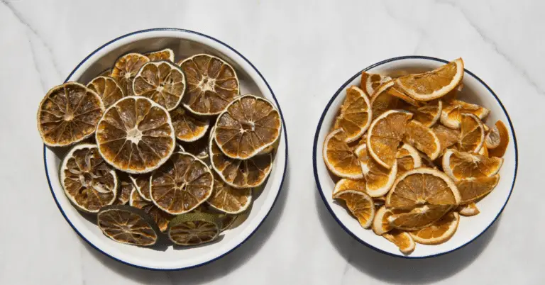 sliced dehydrated oranges on a white tablecloth