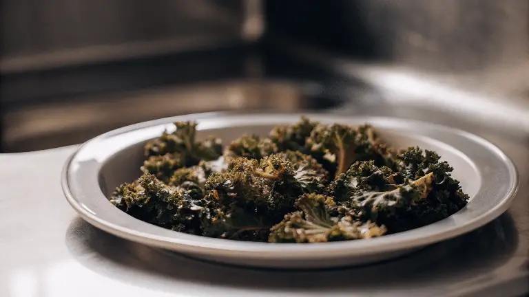 Kale chips on a plate.