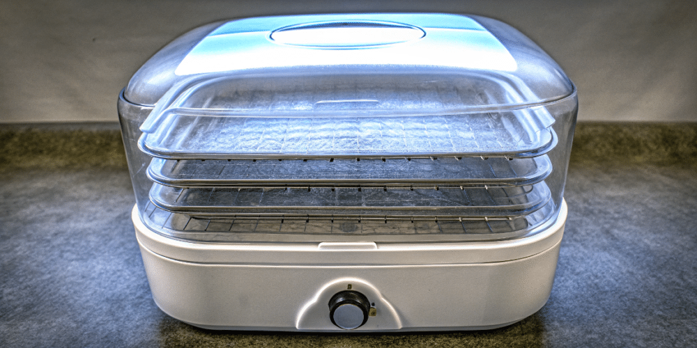 a sleek plastic transparent food dehydrator