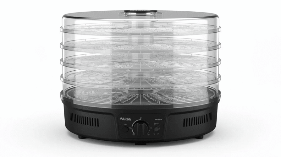 The image features a Waring dehydrator with a circular design, consisting of five stacked trays for drying various foods such as fruits, vegetables, and meats. The top of the dehydrator is transparent, allowing visibility of the drying process, while the bottom is made of black plastic for a sleek appearance.