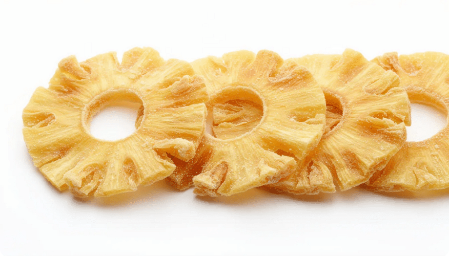 The image features a collection of dried dehydrated pineapple rings, showcasing their crispy texture and vibrant yellow color. These delicious snacks are perfect for trail mix or long-term storage, providing a sweet tropical flavor that satisfies cravings.