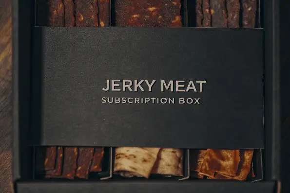 A top down view of a jerky meat subscription box.